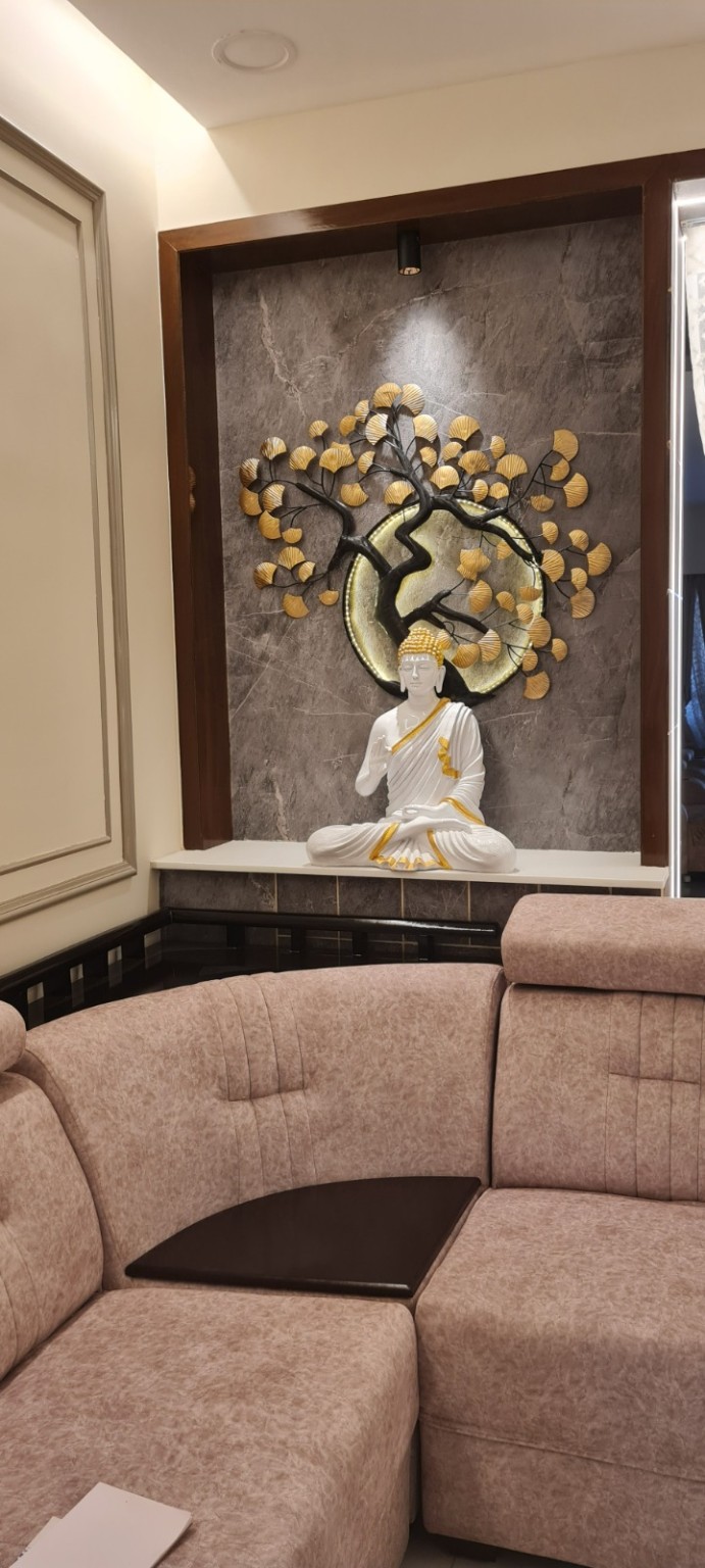 Living room Buddha feature wall with warm lighting